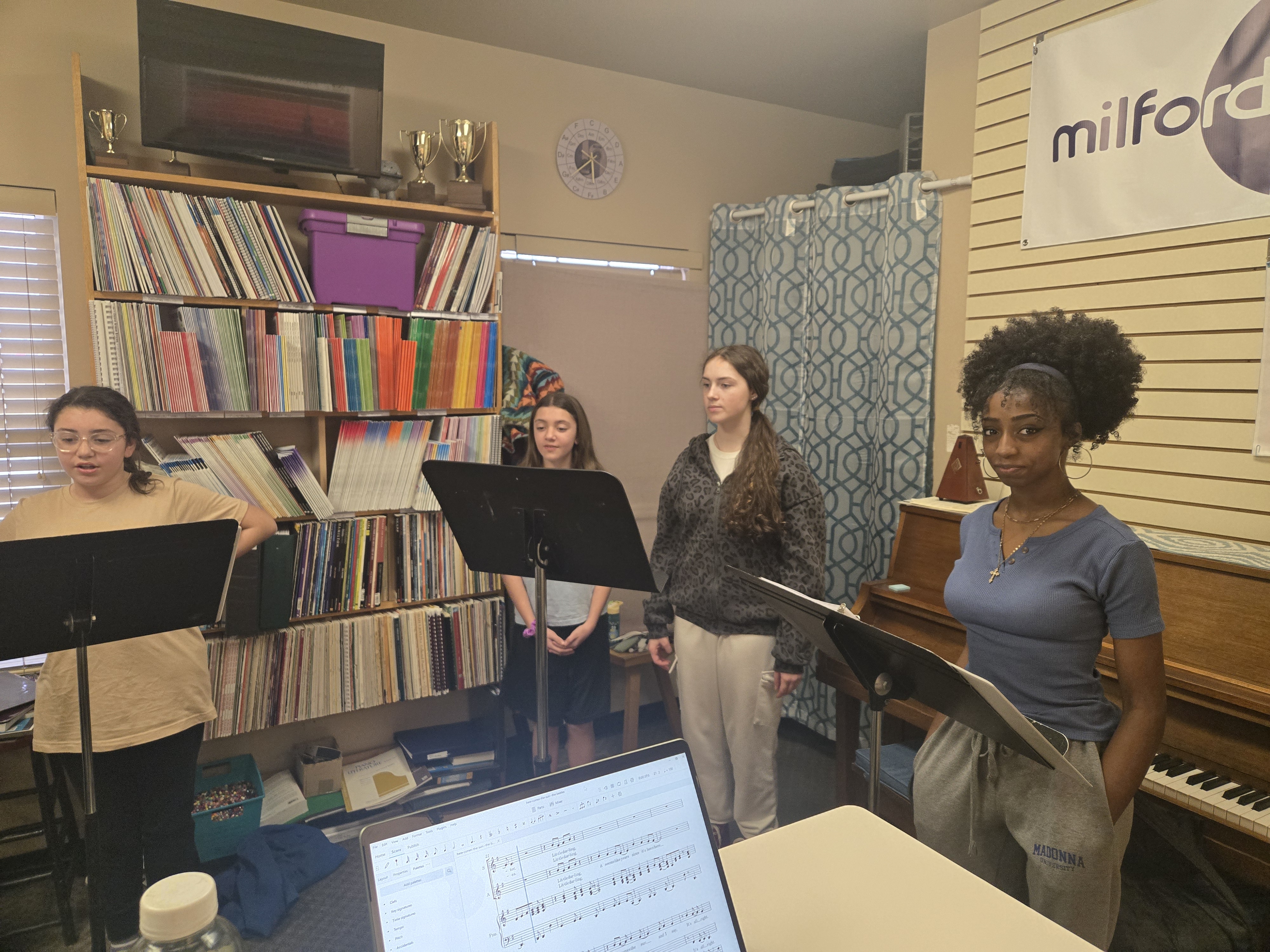 Students rehearsing together in a group lesson